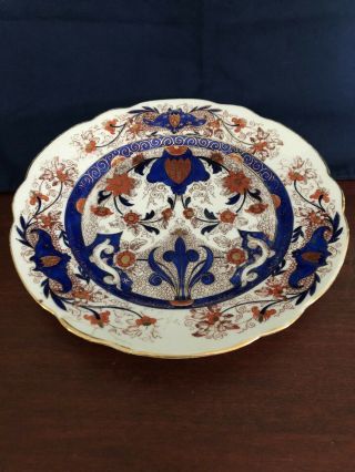Vintage China Plate With Blue,  Orange,  Copper And Gold Accents 10 In.