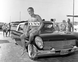 Rossano Brazzi In Swimsuit Posing With His Car At The Beach Photo