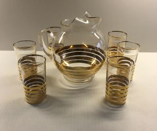 Vintage Retro Gold Striped Pitcher With 6 Gold Rimmed Glasses.