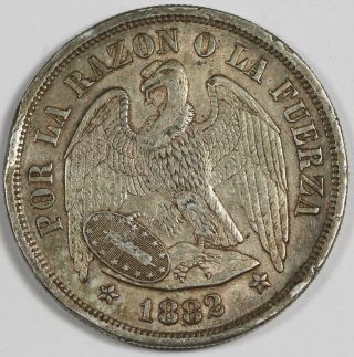 Chile 1882 So 1 Peso 25 Gram 900 Silver Coin Xf,  Km 142.  1 Crown Size Toned