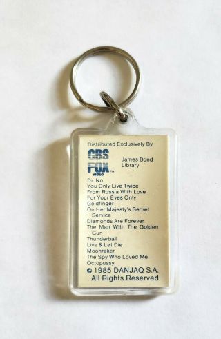 VINTAGE 1985 A VIEW TO A KILL MOVIE PROMO KEYCHAIN - ROGER MOORE JAMES BOND 007 2