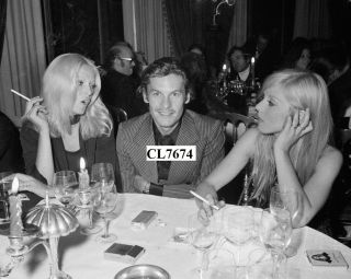 Helmut Berger,  Virna Lisi And Sylvie Vartan At A Party In Paris,  France Photo