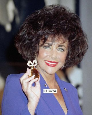 Elizabeth Taylor Holds A Press Conference For Her Perfume " White Diamonds "
