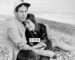 Carrie Fisher With Paul Simon On The Beach In,  France Photo