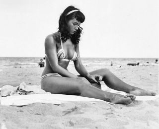 Bettie Page Pensive Sitting On The Sand 8x10 Picture Celebrity Print