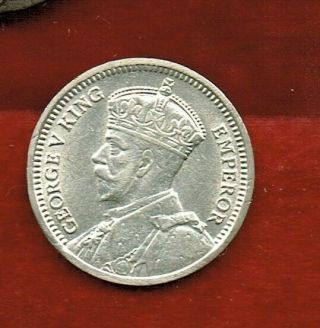 Southern Rhodesia Three Pence 1934 King George V Unc.  Mintage 628.  000