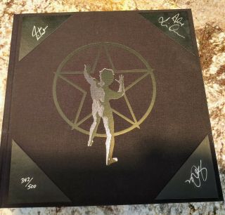 Rush The Complete Tour Book From 1977 - 2004.  Autographed By All Three Members.