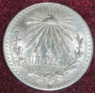 Lovely Gem Bu 1934 Mexico.  720 Silver Un Pesos,  Scarce Date,