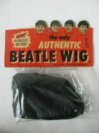 The Beatles " The Only Authentic Beatle Wig "