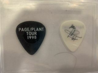1998 Page/plant Tour Guitar Pick Led Zeppelin. . . .  $100.  00