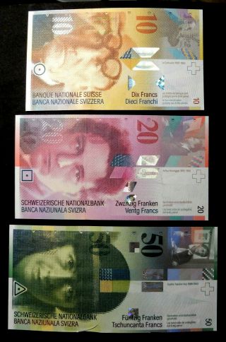 Switzerland 10,  20 50 Francs.  Unc