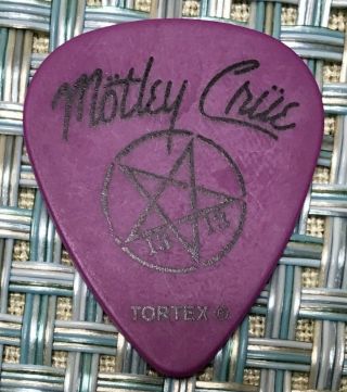 Motley Crue Mick Mars Final Tour Guitar Pick.  Mick Mars Official Tour/stage Pick