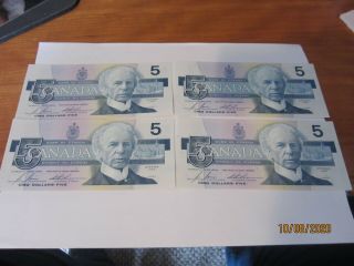4 Uncirculated Canadian 1986 $5 Bank Notes - Consecutive Serial No 