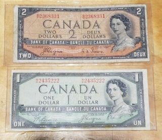 1954 Canada 1 & 2 Dollar Devil Hair Notes Group Of Two Bills