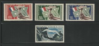 Togo: 1957; Scott C22 - C25,  Arms And Flags,  (2 Value Rust).  Mnh.  Ebto01