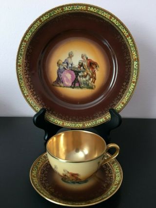 rare antique Vienna style demitasse cup and saucer set with heavy gold 3
