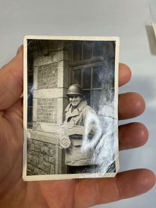 WW2 Photo US Soldier Captured KO’d German Nazi Eagle Building Plaque Picture BW 3