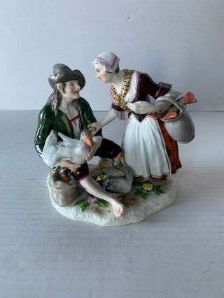Antique Meissen porcelain group of fish and goose seller 2