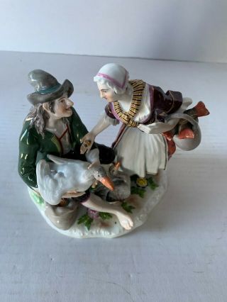 Antique Meissen porcelain group of fish and goose seller 6