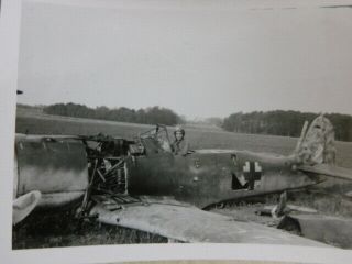 GREAT WW 2 GI PHOTOS OF GERMAN FW 190 AND GERMAN BOMBERS WITH INSCRIPTION ON BAC 2