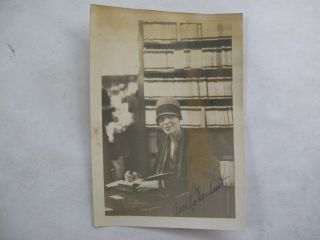 Vintage Photograph of Amelia Earhart Signing 