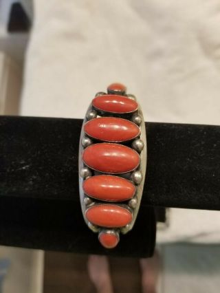 Vintage American Indian Sterling Silver Cuff Bracelet With Coral Settings.