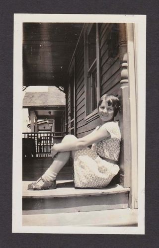 Young Lady Holding Legs Sitting On Porch Old/vintage Photo Snapshot - E427