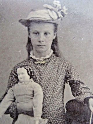 Antique Tintype Young Girl Holding a large Porcelain Doll and Iroquois Purse 3