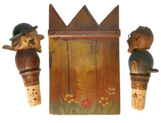 RARE EARLY 20TH C VINT ANRI ITALY PR CRVD/PNTD FIG WOOD BOTTLE STOPPERS W/STAND 6