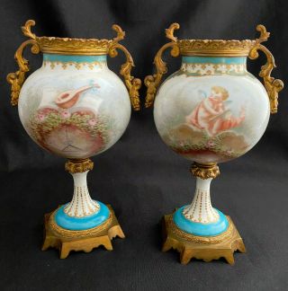 Pair Antique 19th C French Sevres Hp Cherubs Gold Ormolu Urns Vase By E.  Dabon