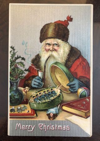 True Vintage Old World Xmas Postcard Santa Embossed Smoking Pipe Tin Toy Soldier