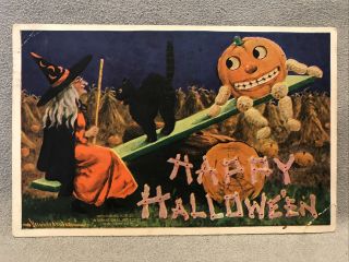 Vintage Happy Halloween Post Card.  Witch Black Cat Pumpkin On Teetter Totter