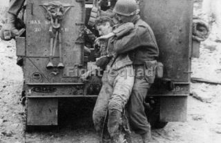Ww2 Picture Photo France 1944 Us Soldier Picks Up A Wounded German Soldier 3290