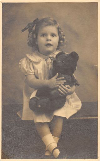 R163968 Old Postcard.  Girl With Teddy Bear