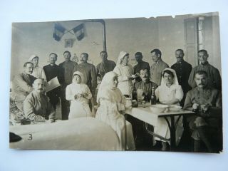 Ww1 French Soldiers With Nurses.  Looks Like A Hospital Ward.  Flags On Wall