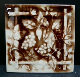 Providential Antique Tile With Vine
