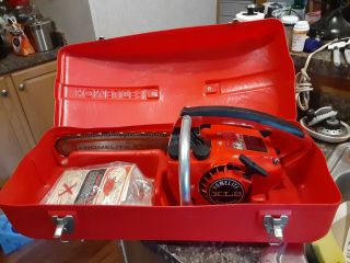 Vintage 1979 Homelite Xl2 Chainsaw W/12 Inch Bar,  Chain,  And Case