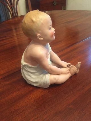 Antique Gebruder Heubach Piano Baby Boy Touching Toes German Bisque Porcelain