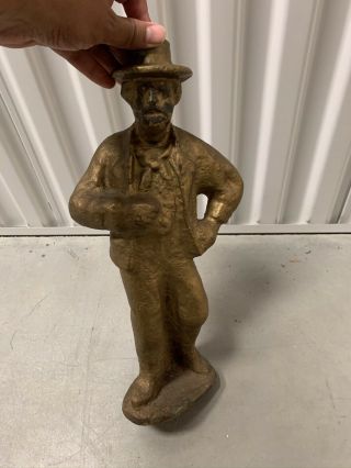 Large Antique Cast Iron Doorstop Of A Dancing Man Figure Wearing A Hat