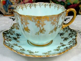 Paragon Trailing Gold Gilt Floral Vines Blue Embossed Tea Cup And Saucer