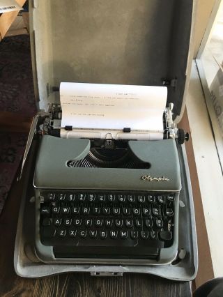 Vintage Olympia Deluxe Portable Typewriter With Hard Shell Case