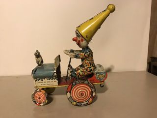 Vintage Unique Art Mfg.  Co.  Artie The Clown Tin Wind Up Car