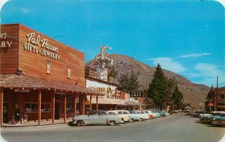 Vintage Postcard; Street Scene By Town Square Jackson Wy Signs Cool Cars