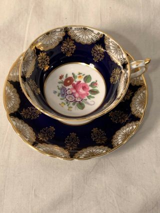 Paragon By Appointment China Cobalt Blue Cup And Saucer Floral Center Gold Trim