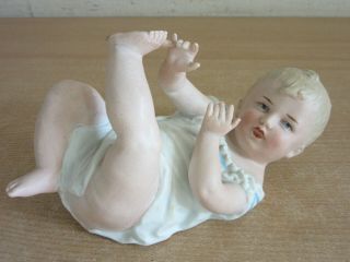Antique German Heubach Porcelain Figurine Baby Boy On His Back 7.  5 "