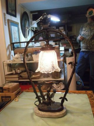 Vintage/antique Metal Fairy Lamp With Clear Glass Globe And A Marble Base.