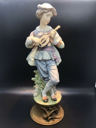 Vintage Biscuit Porcelain Figure Of A Lute Player