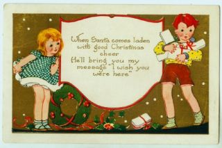 102520 Vintage Christmas Postcard Two Children Boy Carries Presents Whitney Made