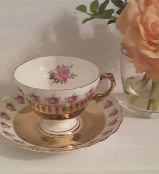 Vintage Rose And Gold Teacup Are Saucer