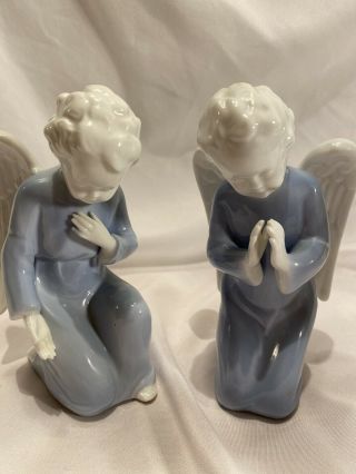 2 - Vintage Reginart Porcelain Kneeling Angel Figurines Blue White Made In Japan